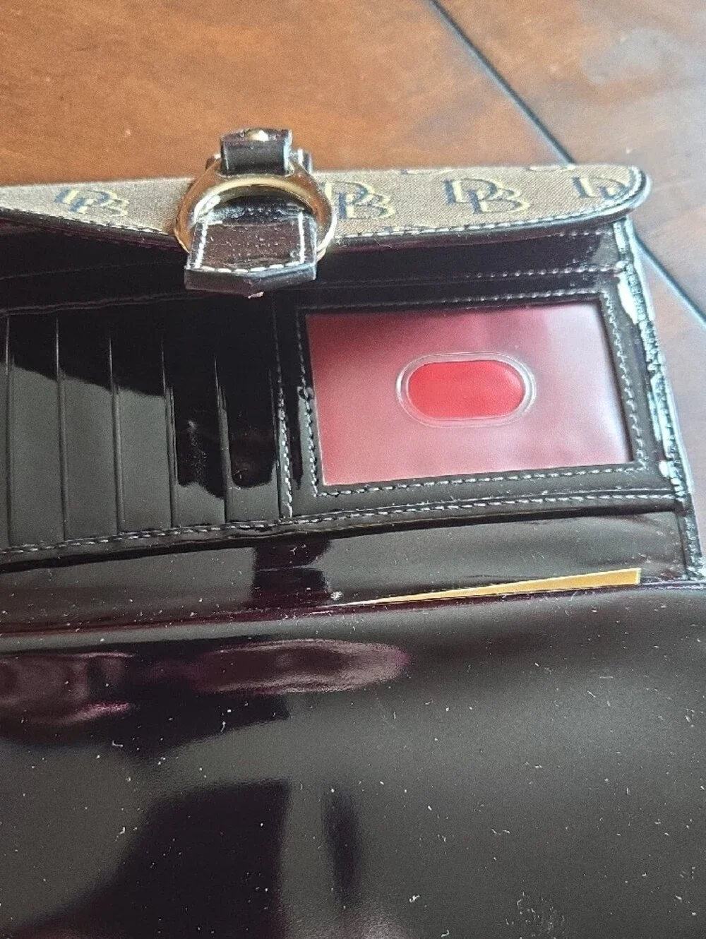 Dooney & Bourke Brown Monogram Card Holder with Black Strap